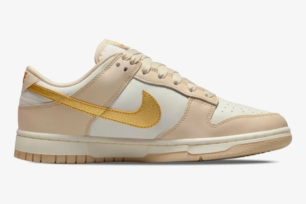 nike-dunk-low-phantom-metallic-gold-side-view-dx5930-001 Nike Dunk Low Essential Trend Women's shoe in Phantom and Metallic Gold, side profile view. - SKU DX5930-001