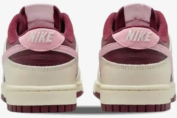 Rear view of Nike Dunk Low Premium Valentine's Day sneakers in maroon, pink, and cream colors. - SKU DR9705-200