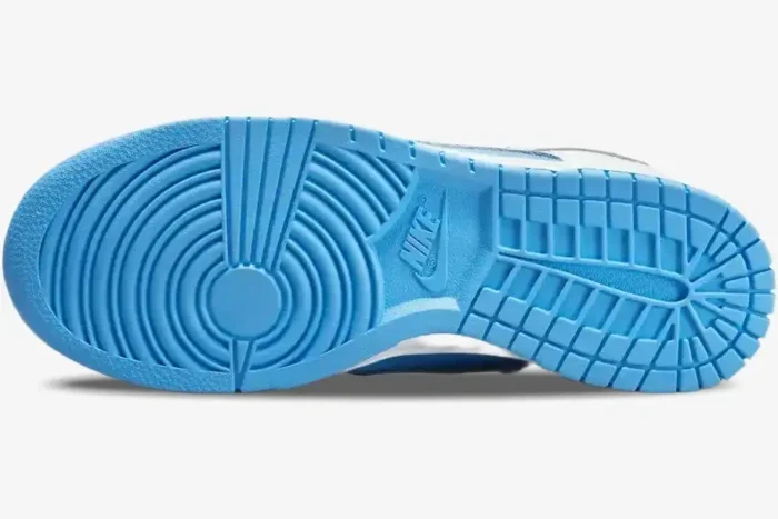 Bottom view of the light blue outsole of a Nike Dunk Low Reverse University Blue sneaker. - SKU DJ9955-101