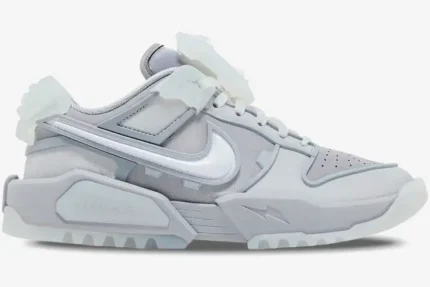 Side profile of Nike Dunk Low x RTFKT Void Limited Edition in light grey with futuristic translucent accents. - SKU HQ3034-001