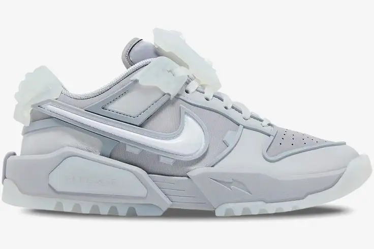 nike-dunk-low-rtfkt-void-grey-side-view-hq3034-001-img2608 Side profile of Nike Dunk Low x RTFKT Void Limited Edition in light grey with futuristic translucent accents. - SKU HQ3034-001