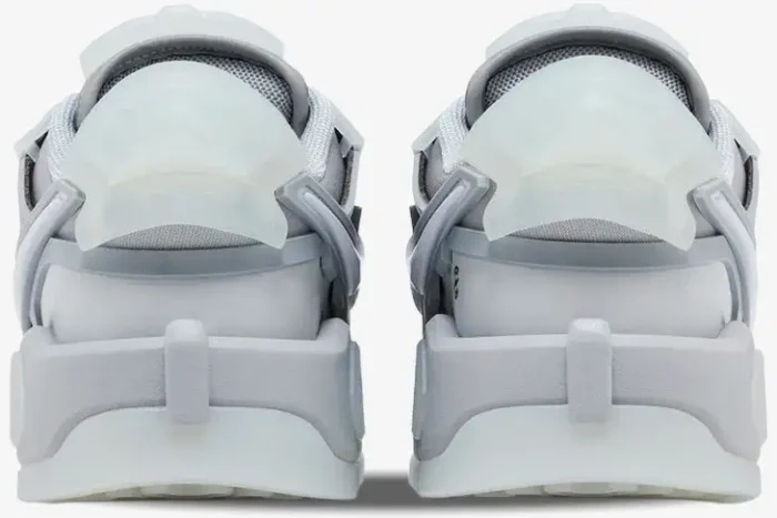 Rear view of the Nike Dunk Low x RTFKT Void Limited Edition shoes in light grey and white. - SKU HQ3034-001