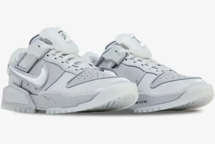 Nike Dunk Low x RTFKT Void Limited Edition sneakers in white and grey, three-quarter view. - SKU HQ3034-001