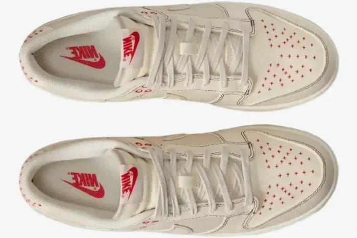 Top-down view of Nike Dunk Low SE Sashiko in Light Orewood Brown with red cross-stitch details on the toe. - SKU DV0834-100