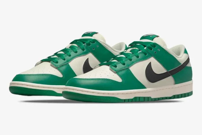 Nike Dunk Low SE Lottery Malachite Green sneakers, three-quarter front view, sail and green leather. - SKU DR9654-100