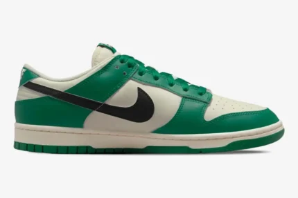 Nike Dunk Low SE Lottery Malachite Green sneakers, side profile view with sail and black accents. - SKU DR9654-100