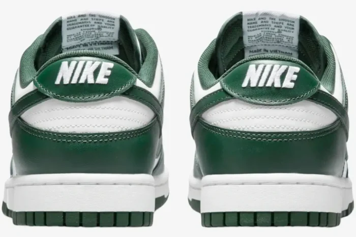 Rear view of Nike Dunk Low Michigan State Spartan Green sneakers in white and dark green leather. - SKU DD1391-101