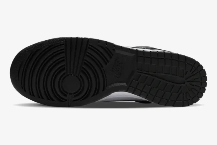 Bottom view of the black rubber outsole for the Nike Dunk SB Low Panda sneaker. - SKU DD1391-100
