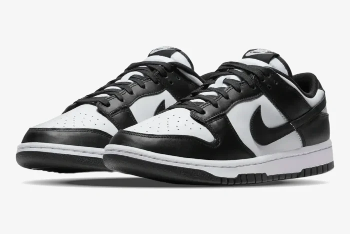 Nike Dunk SB Low Retro White Black Panda sneakers in a front three-quarter view. - SKU DD1391-100
