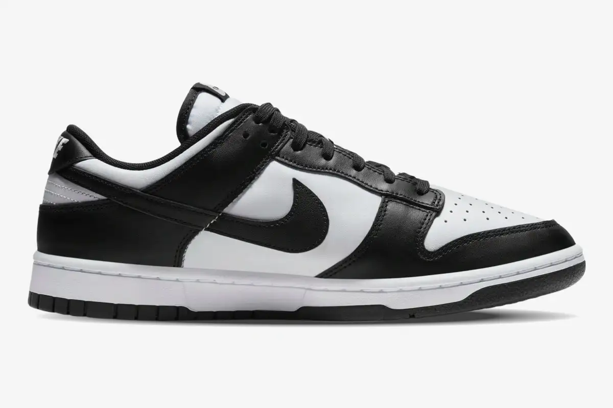 nike-dunk-sb-low-retro-panda-side-profile-dd1391-100 Nike Dunk SB Low Retro White Black Panda sneaker shown from a side profile perspective. - SKU DD1391-100