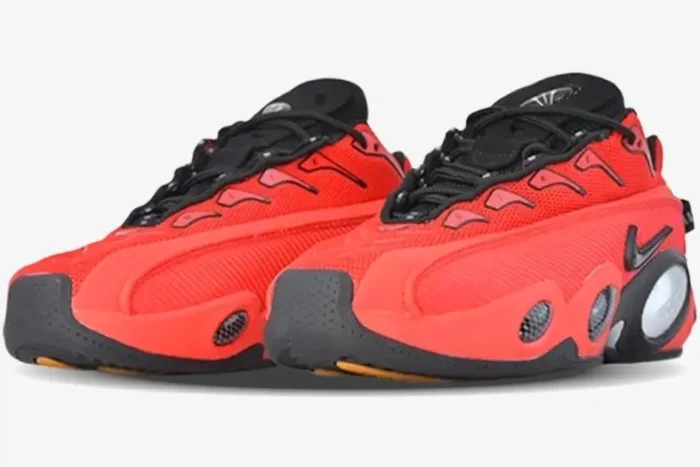 Nike Glide x NOCTA sneakers in red and black, shown from a three-quarter front perspective. - SKU DM0879-600