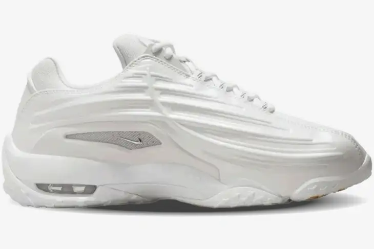 nike-hot-step-2-nocta-total-white-side-view-dz7293-100 Side profile of the Nike Hot Step 2 x NOCTA sneaker in total white with molded ridges and visible Air unit. - SKU DZ7293-100