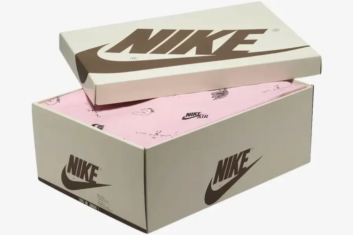 Off-white and brown Nike shoebox for Travis Scott Jordan 1 Low Golf with pink tissue paper. - SKU FZ3124-200