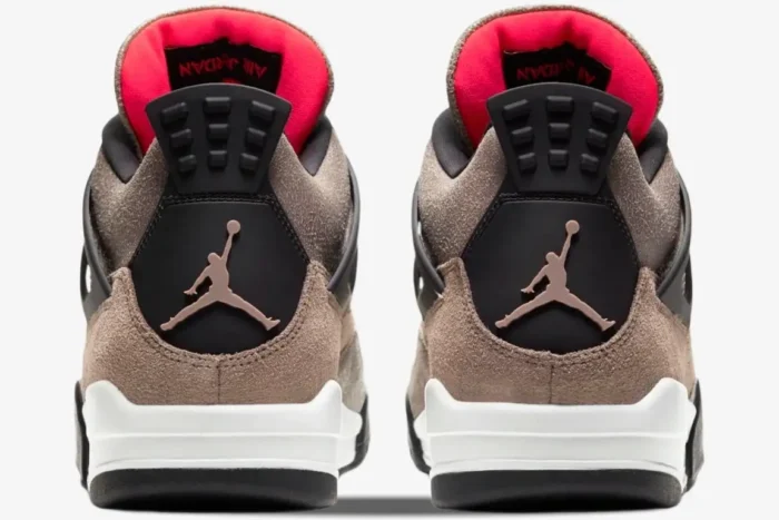 Rear view of Air Jordan 4 Retro Taupe Haze sneakers with black heel tabs and taupe Jumpman logos. - SKU DB0732-200