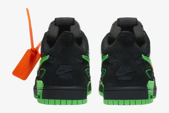 Rear view of Nike Air Rubber Dunk x Off-White Green Strike sneakers in black and green with signature orange zip tie. - SKU CU6015-001