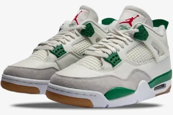 Three-quarter view of Air Jordan 4 Retro x Nike SB Pine Green sneakers with white leather and gum soles. - SKU DR5415-103