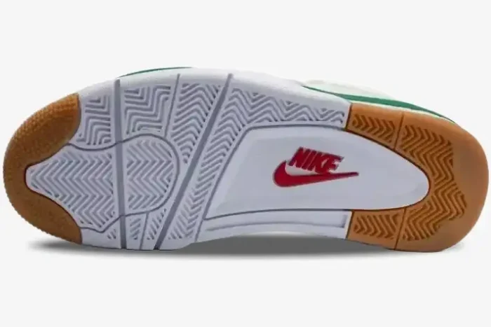 Bottom outsole view of Air Jordan 4 Retro x Nike SB Pine Green with white, gum, and red Nike logo. - SKU DR5415-103