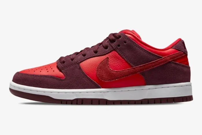 Nike SB Dunk Low Cherry sneaker in red and burgundy suede, side profile view on a white background. - SKU DM0807-600