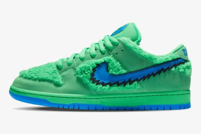 Side profile of Nike SB Dunk Low Grateful Dead Bears in green faux fur and suede with blue swoosh. - SKU CJ5378-300