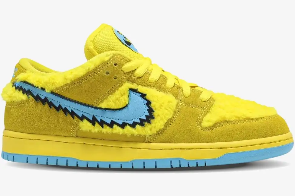 nike-sb-dunk-low-grateful-dead-opti-yellow-side-cj5378-700-img2088 Nike SB Dunk Low Grateful Dead Bears Opti Yellow fuzzy sneaker with blue jagged swoosh, side profile view. - SKU CJ5378-700