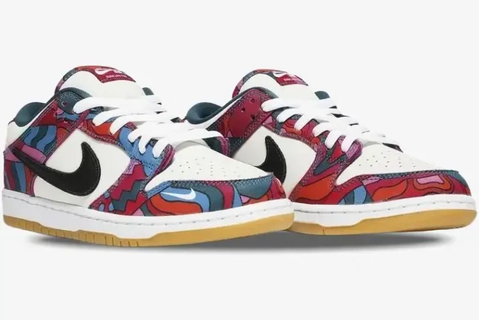 Nike SB Dunk Low x Parra Abstract sneakers with colorful patterns and gum soles, three-quarter front view. - SKU DH7695-600