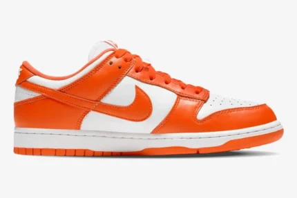 Side view of the Nike SB Dunk Low Syracuse in vibrant orange and white leather. - SKU CU1726-101