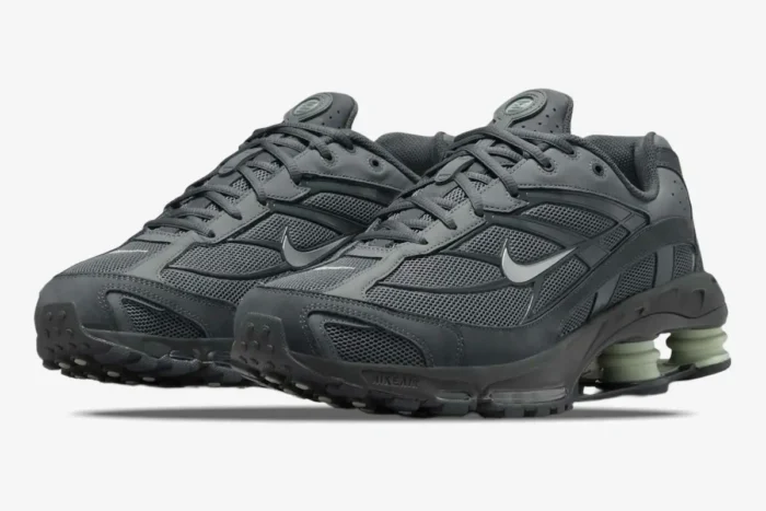 Nike Shox Ride 2 in Anthracite and Iron Grey, three-quarter front view showing Jade Horizon pillars. - SKU HV2540-001