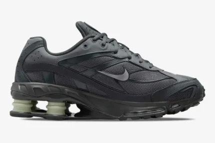 Nike Shox Ride 2 in Anthracite and Iron Grey, side profile view showing the Jade Horizon Shox columns. - SKU HV2540-001