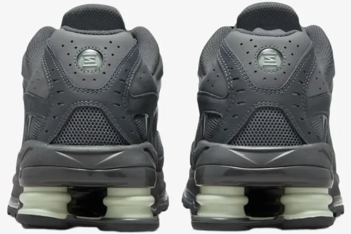 Rear view of Nike Shox Ride 2 sneakers in Anthracite Iron Grey with Jade Horizon shox columns. - SKU HV2540-001