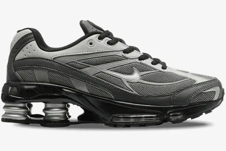 nike-shox-ride-2-light-graphite-black-side-ib4470-099 Nike Shox Ride 2 sneakers in Light Graphite and Black, shown from a side profile view. - SKU IB4470-099