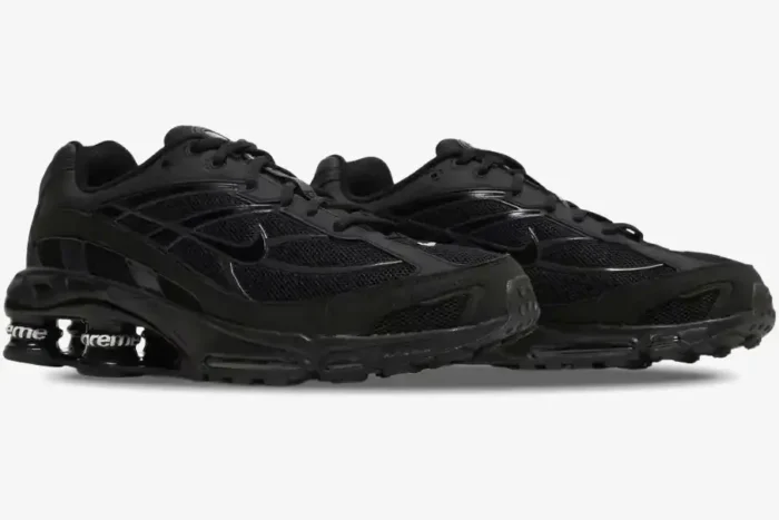 Side profile of black Nike Shox Ride 2 x Supreme sneakers featuring branded Shox pillars and mesh uppers. - SKU DN1615-001