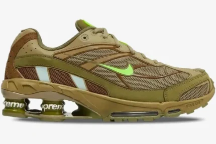 Nike Shox Ride 2 x Supreme Neutral Olive sneaker in a side profile view with neon green accents. - SKU DN1615-200