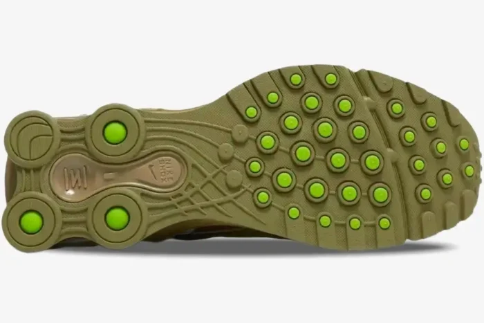 Sole view of Nike Shox Ride 2 x Supreme Neutral Olive sneakers with bright green tread accents. - SKU DN1615-200