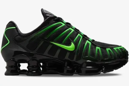 Side view of Nike Shox TL Black Green Strike sneaker with vibrant green accents and black columns. - SKU AV3595-012