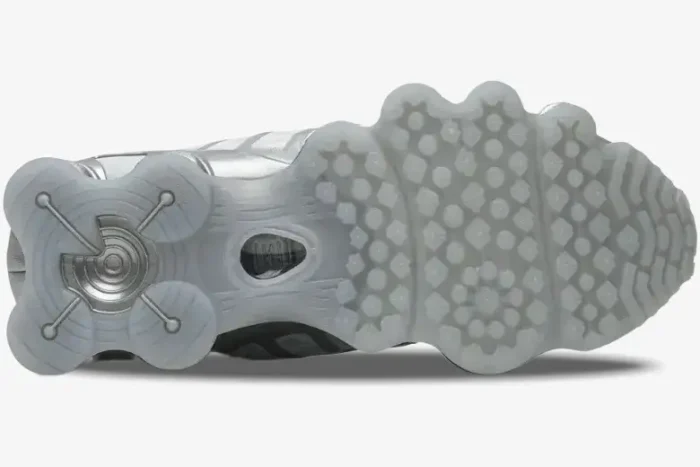 Bottom view of Nike Shox TL Pure Platinum Chrome sneakers showing the textured silver rubber outsole. - SKU AV3595-003