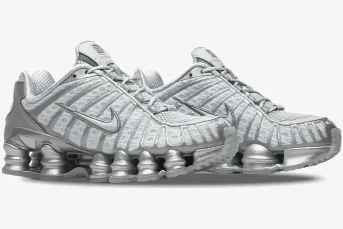 Pair of Nike Shox TL Pure Platinum Chrome sneakers in metallic silver, side-profile view. - SKU AV3595-003
