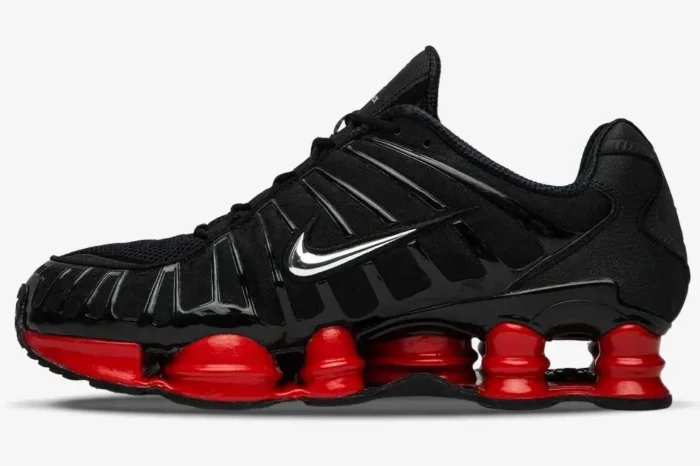 Side profile of Nike Shox TL x Skepta sneakers in black and university red with a metallic silver swoosh. - SKU CI0987-001