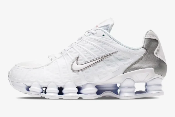 Nike Shox TL sneaker in white and metallic silver, shown from a side profile view. - SKU AV3595-100