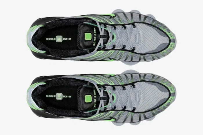 Top-down view of Nike Shox TL sneakers in wolf grey and lime blast green showing the insoles. - SKU AV3595-005