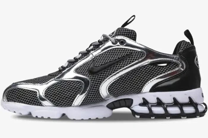 Nike Air Zoom Spiridon Cage 2 x Stussy in Pure Platinum, side profile view with silver overlays and black mesh. - SKU CU1854-001