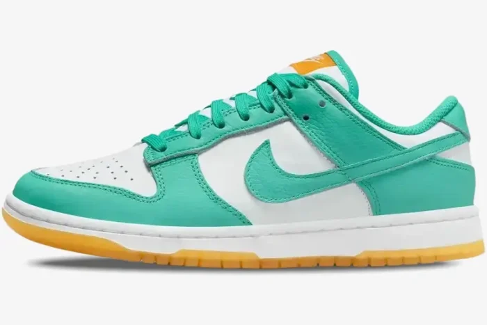Nike Wmns Dunk Low 'Teal Zeal' sneaker in white and teal, side profile view with gum sole. - SKU DV2190-100