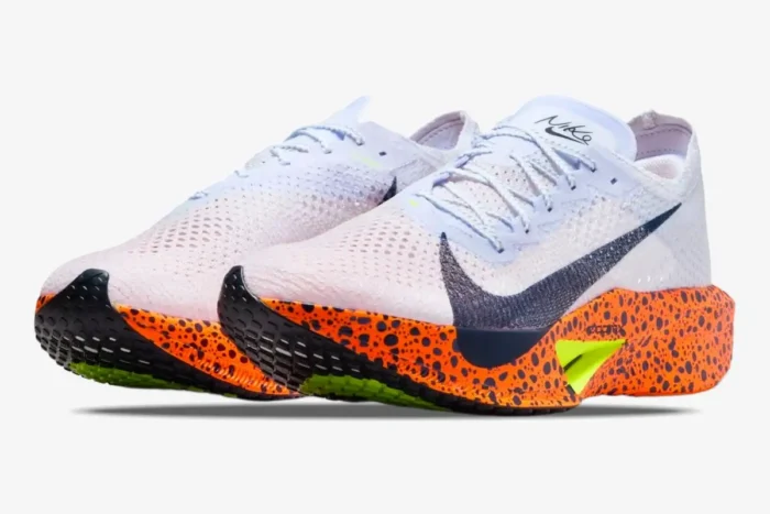 Nike ZoomX Vaporfly 3 Olympic Safari running shoes in white and orange, three-quarter front view. - SKU FV2324-100