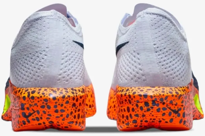 Rear view of Nike ZoomX Vaporfly 3 shoes with white mesh uppers and orange safari print midsoles. - SKU FV2324-100