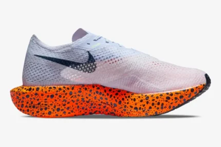 Nike ZoomX Vaporfly 3 running shoe in white and orange safari print, side profile view. - SKU FV2324-100