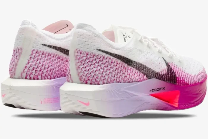 Rear view of Nike ZoomX Vaporfly 3 women's marathon shoes in white, pink, and orange. - SKU DV4129-104