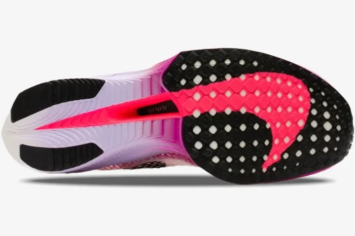 Bottom view of Nike ZoomX Vaporfly 3 women's marathon shoe in white and pink showing the outsole tread. - SKU DV4129-104