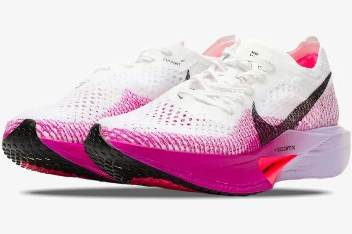 Nike ZoomX Vaporfly 3 women's marathon shoe in white and pink, three-quarter side view. - SKU DV4129-104