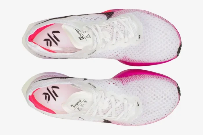 Top-down view of Nike ZoomX Vaporfly 3 women's marathon shoes in white and pink. - SKU DV4129-104