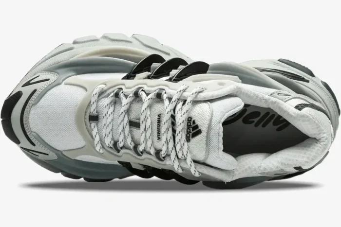 Top-down view of the Pharrell x VIRGINIA x adidas Adistar Jellyfish in Solid Grey Black with patterned laces. - SKU JP9265