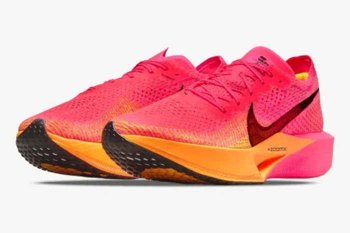 Nike ZoomX Vaporfly 3 pink and orange performance running shoes, front side perspective view. - SKU DV4129-600